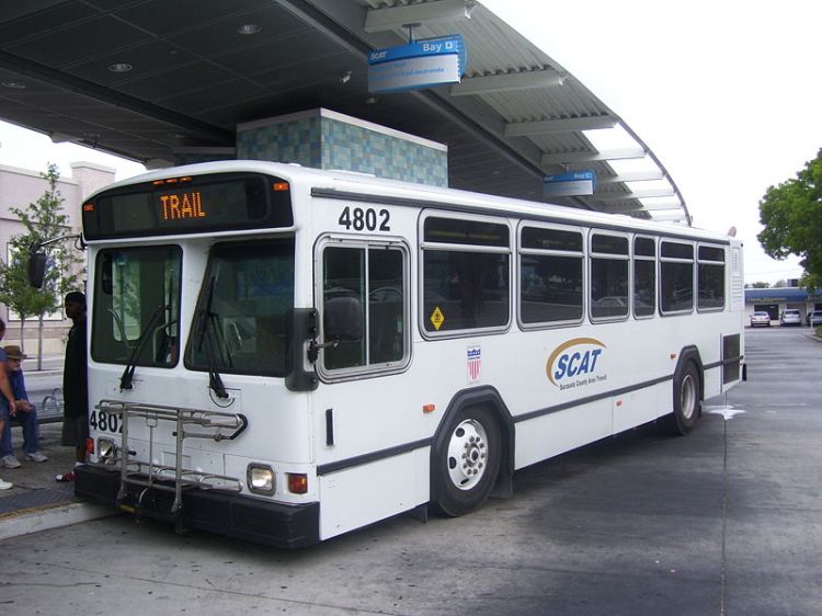 A SCAT bus awaits departure from the downtown Sarasota transfer center. Photo Credit: HARTride 2012.