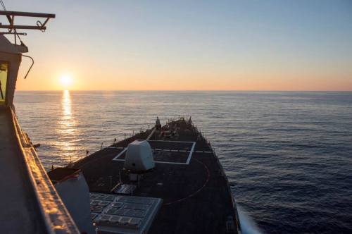 Looking into the sunrise (or sunset, depending how you look at it) from the USS Ramage (DDG 61). The US Navy guided missile destroyer is on a Mediterranean deployment until the spring of 2014. This particular photo made the weekly cover photo rounds on the US Navy's official Facebook page during the week of November 4, 2013. Photo credit: US Navy.
