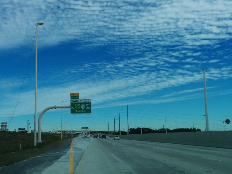 Interstate 4 going eastbound at Exit 2, which is now dedicated to the newly opened I-4/Selmon Expressway Connector. The new elevated highway opened to traffic on Monday, January 6, 2014. Exit 2 along I-4 was originally an exit to 40th St. However, that exit was permanently removed during interstate reconstruction during the early/mid 2000s to accommodate the new connector. Photo taken by HARTride 2012. January 7, 2014.