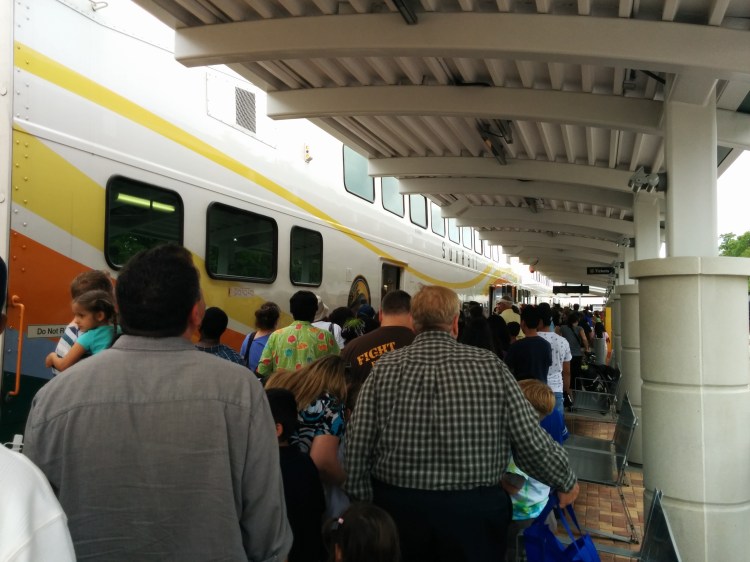 The crowds board the train. Photo Credit: HARTride 2012. May, 2014.